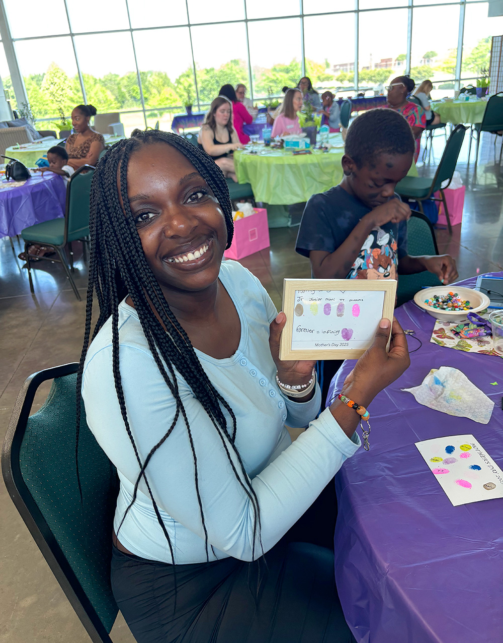 dallas-mothers-day-2025_3625 Smiling mother with her baby boy taking a selfie