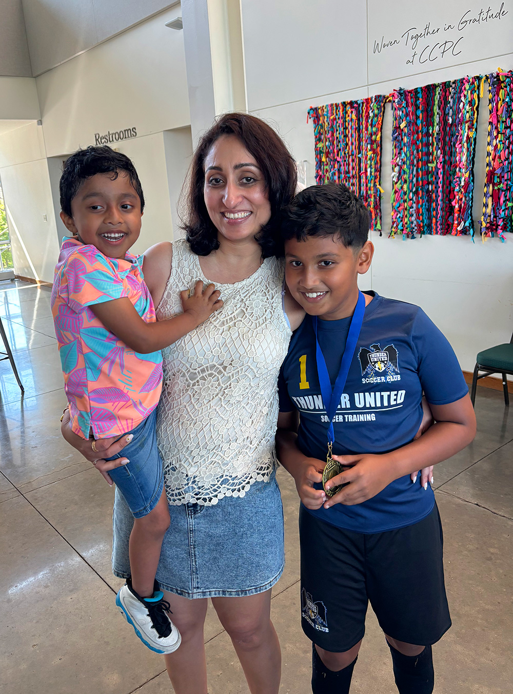 Mom or babysitter and adopted child daughter practicing yoga together at home. Healthy lifestyle